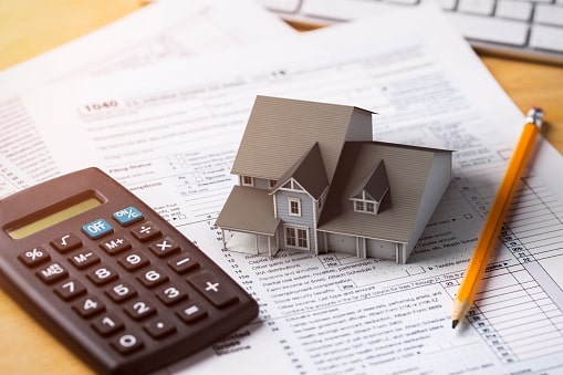 Tax Implications of Buying Property in Canada's Homepage