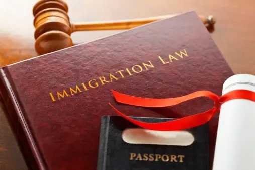 gavel, book and passport