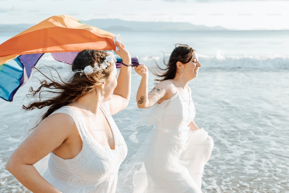 two woman running bringing a scarf